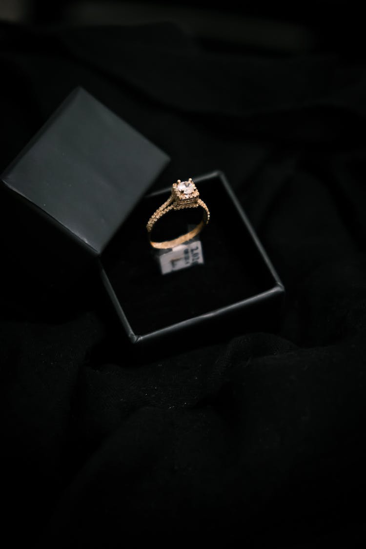 Gold Ring With Diamond In A Box