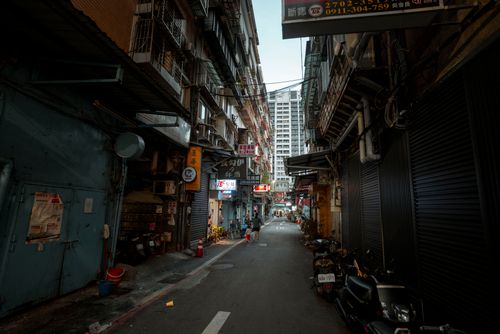 Free Explore a narrow alleyway, rich with urban life and cityscape charm in Taipei, Taiwan. Stock Photo