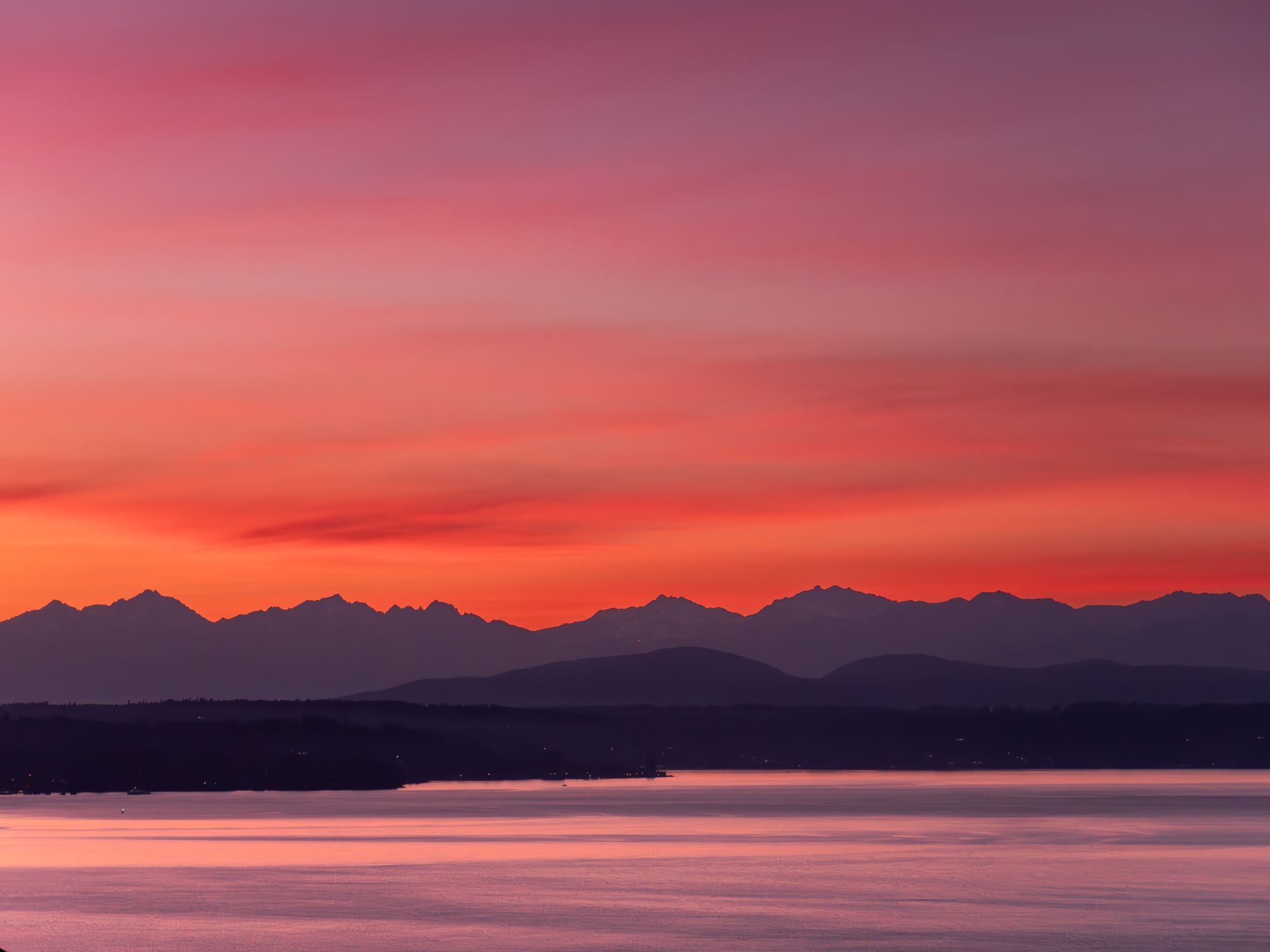 Silhouettes of Distant Mountains against Red and Purple Twilight Sky ...