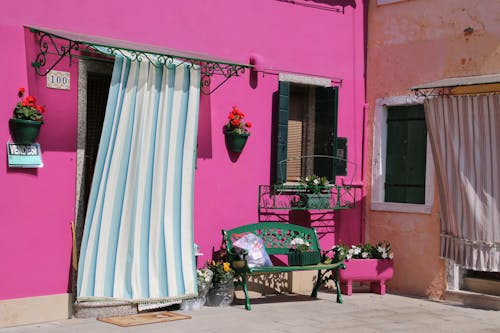 Curtains Covering Doors in a Town