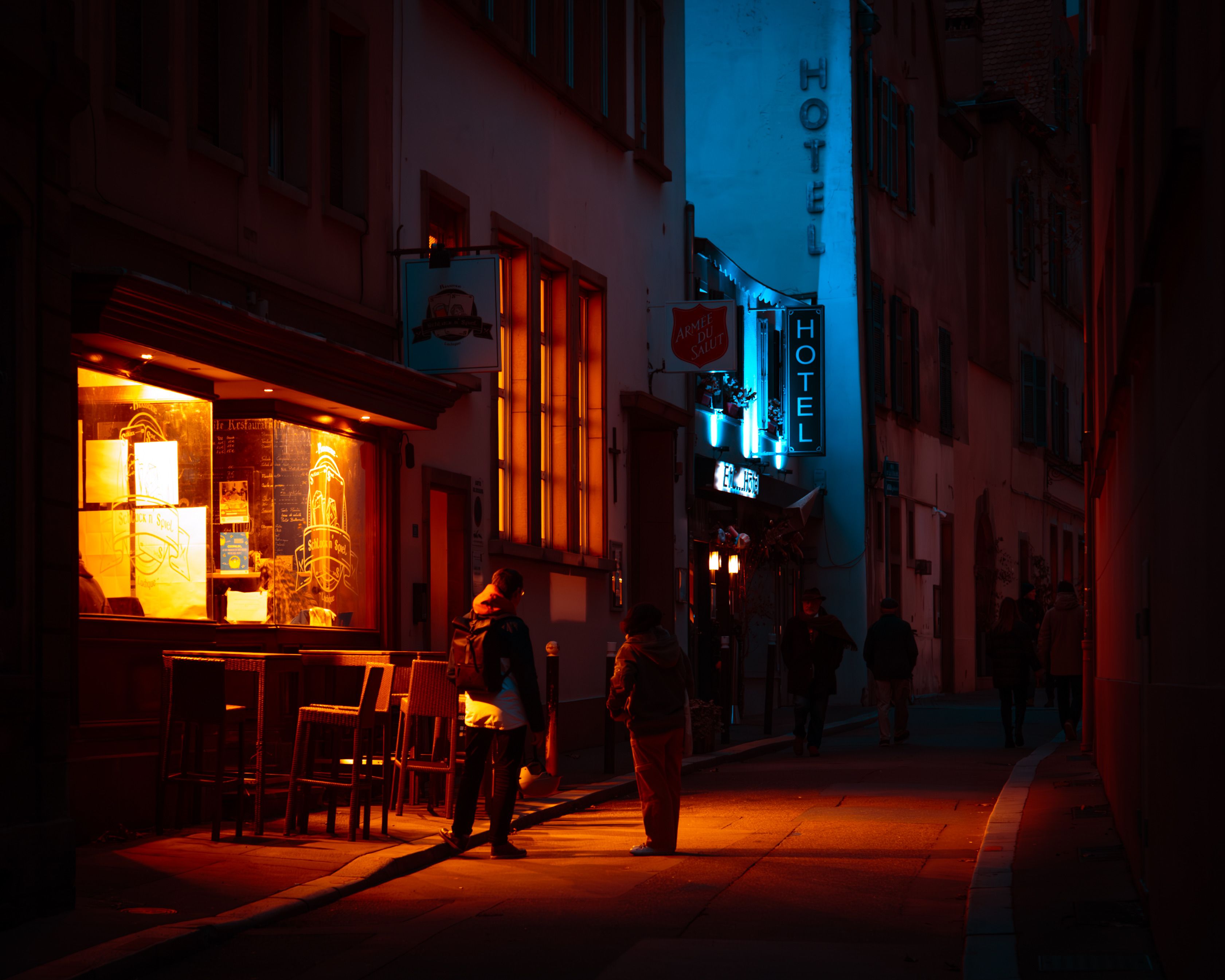 People Standing on a City Street at Night · Free Stock Photo
