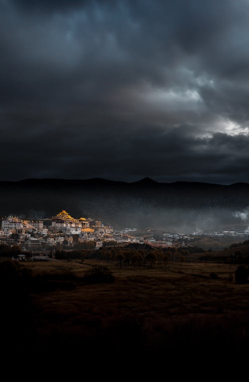 Epic Cityscape with Dark Clouds