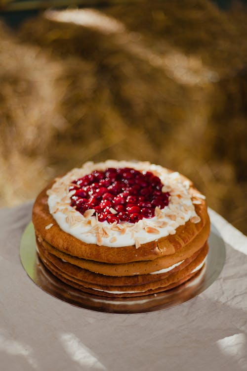 Close-up of a Layer Cake with Cream and Jam