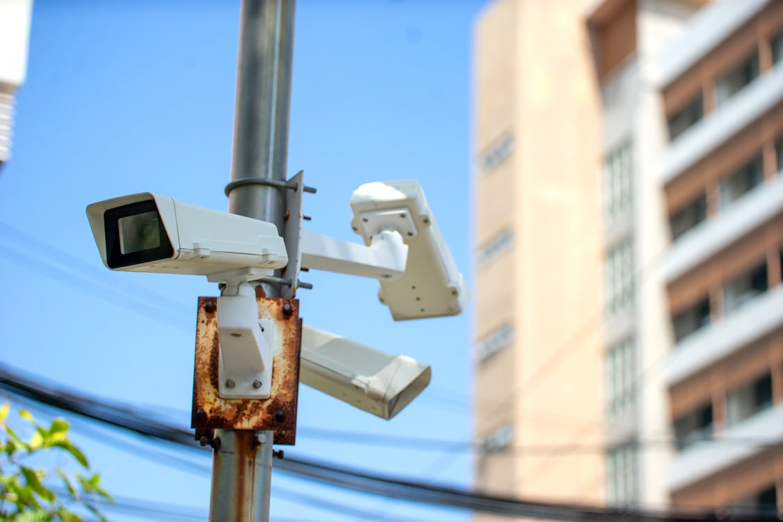 A stock photo of a CCTV (Closed Circuit Television) typically features an image or illustration related to surveillance, security, or monitoring systems. This type of image could include