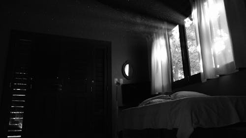 Bed by the Window in Black and White 