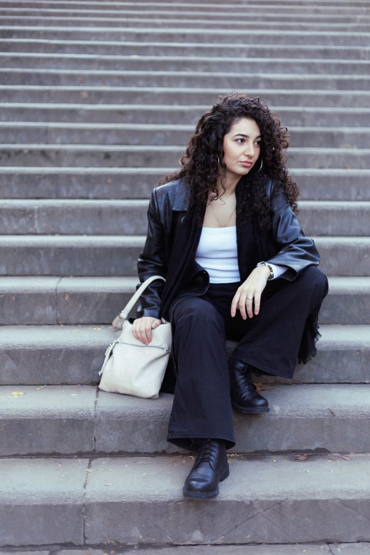 Beautiful Woman Sitting On Steps