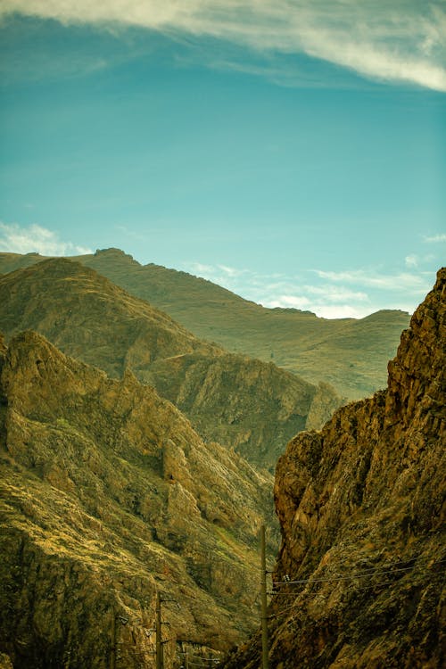 Landscape of Rocky Mountains under Blue Sky 