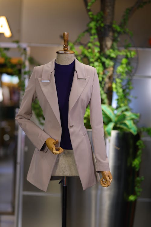 A Tailored Jacket Hanging on a Mannequin 