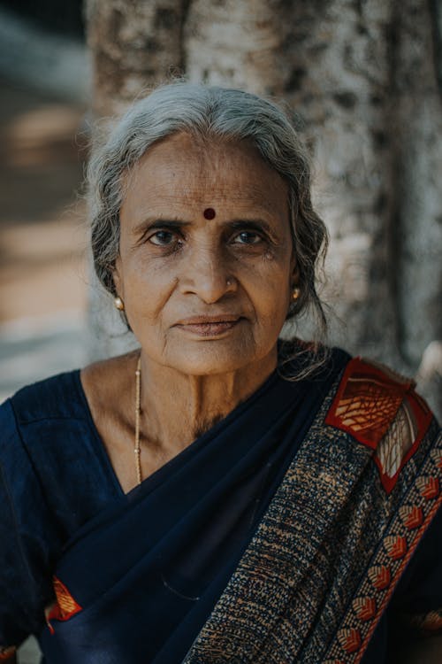 Elegant Elderly Woman in Sari
