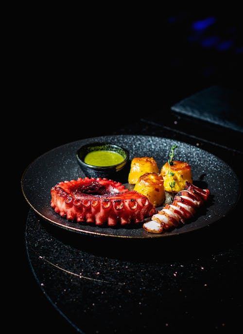 Seafood on a Black Plate