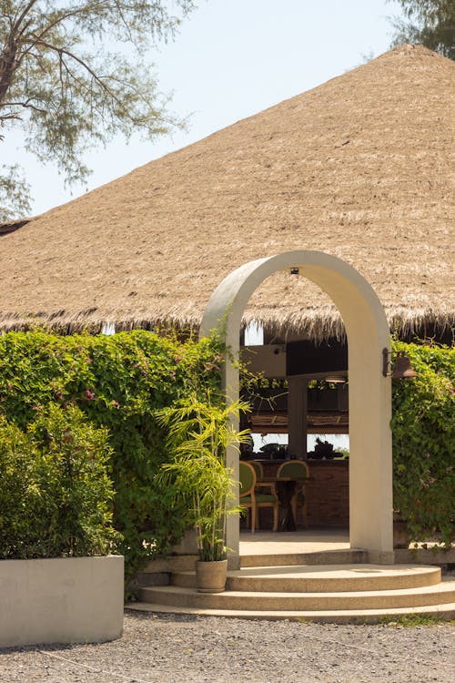 Entrance to a Venue with a Thatched Roof