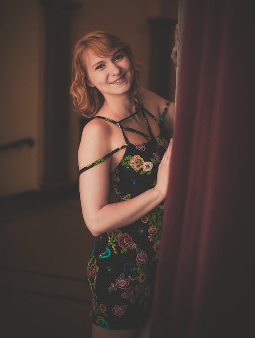 Smiling Woman in Black Dress