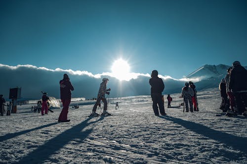 Skiers at Foggy Sunrise