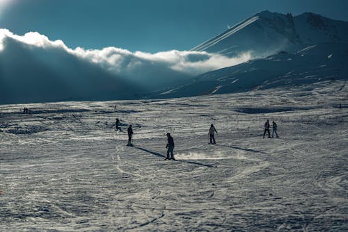 People Skiing on a Slope 