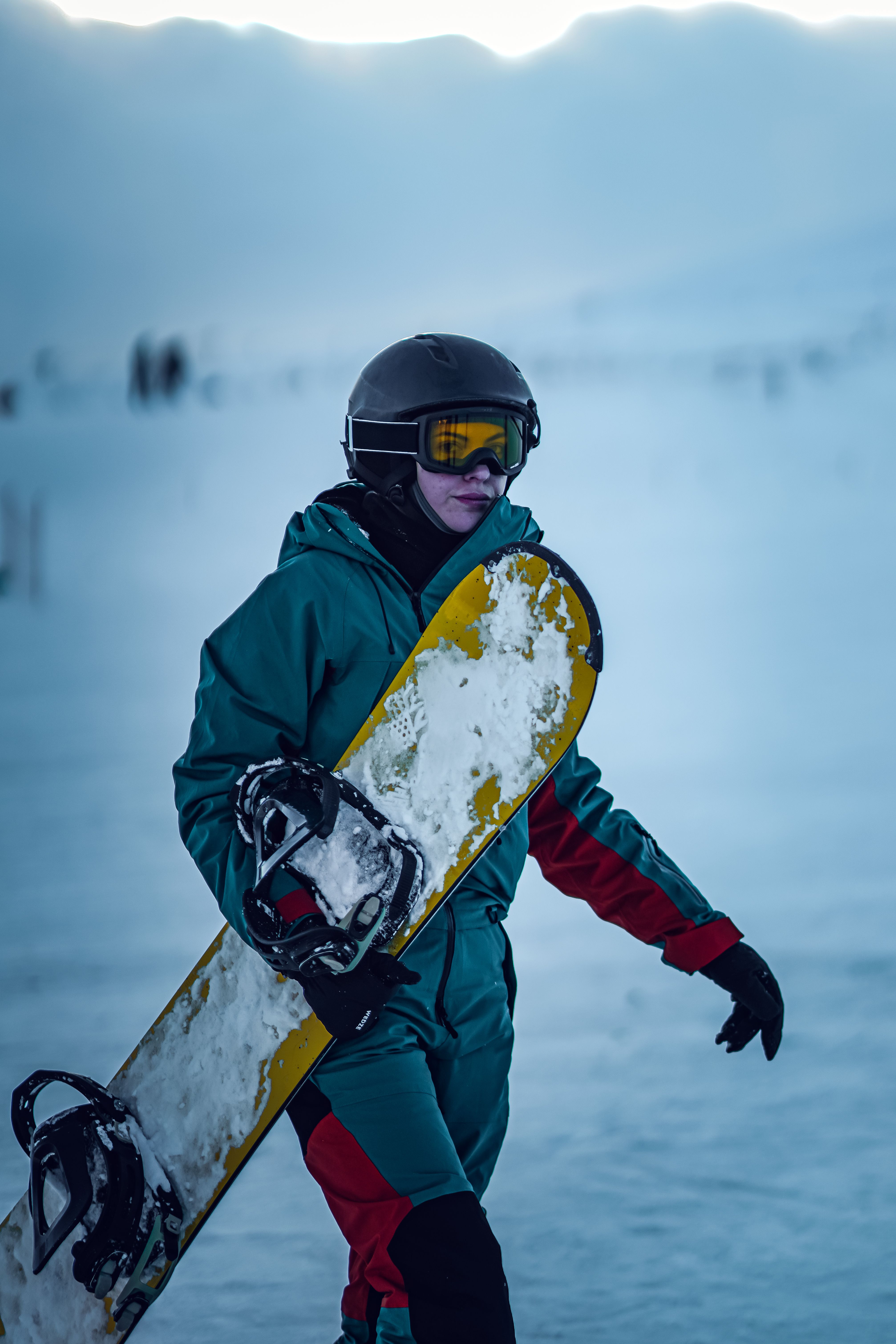 Woman Holding a Snowboard · Free Stock Photo