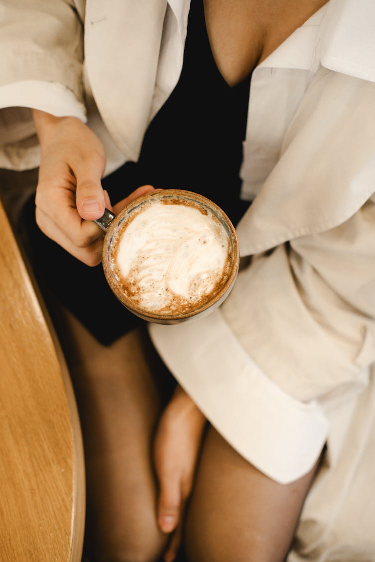 Woman Hand Holding Coffee Cup