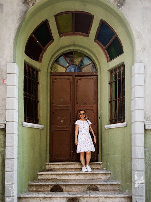 Woman in Front of a Wooden Doorway 