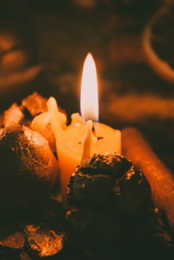Beeswax pillar candles alight — photo by Dagmara Dombrovska on Pexels