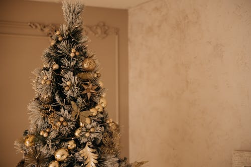 A Christmas Tree with Golden Ornaments 