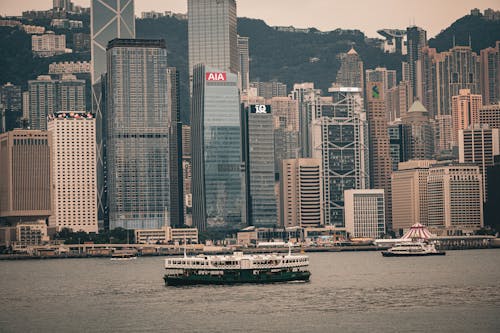 Безкоштовне стокове фото на тему «будівлі, вітрильний спорт, Гонконг»