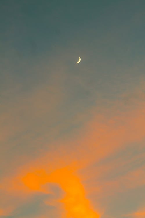 View of a Sunset Sky and Crescent Moon 