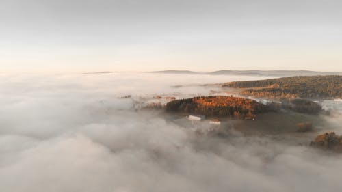 Aerial View of a Land Covered in Fog 