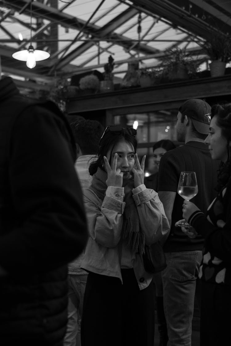 People Drinking In A Bar