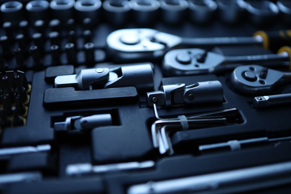 How AI Tools Solve Email Marketing Copywriting Challenges for Creators Detailed view of assorted metal tools organized in a toolbox, showcasing precision engineering.