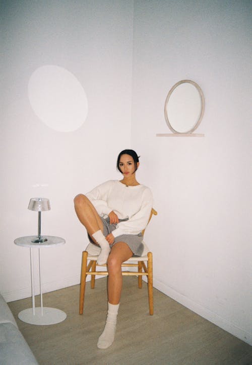 Woman Sitting on Chair