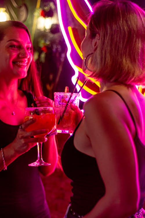 Women Drinking Cocktail on Party