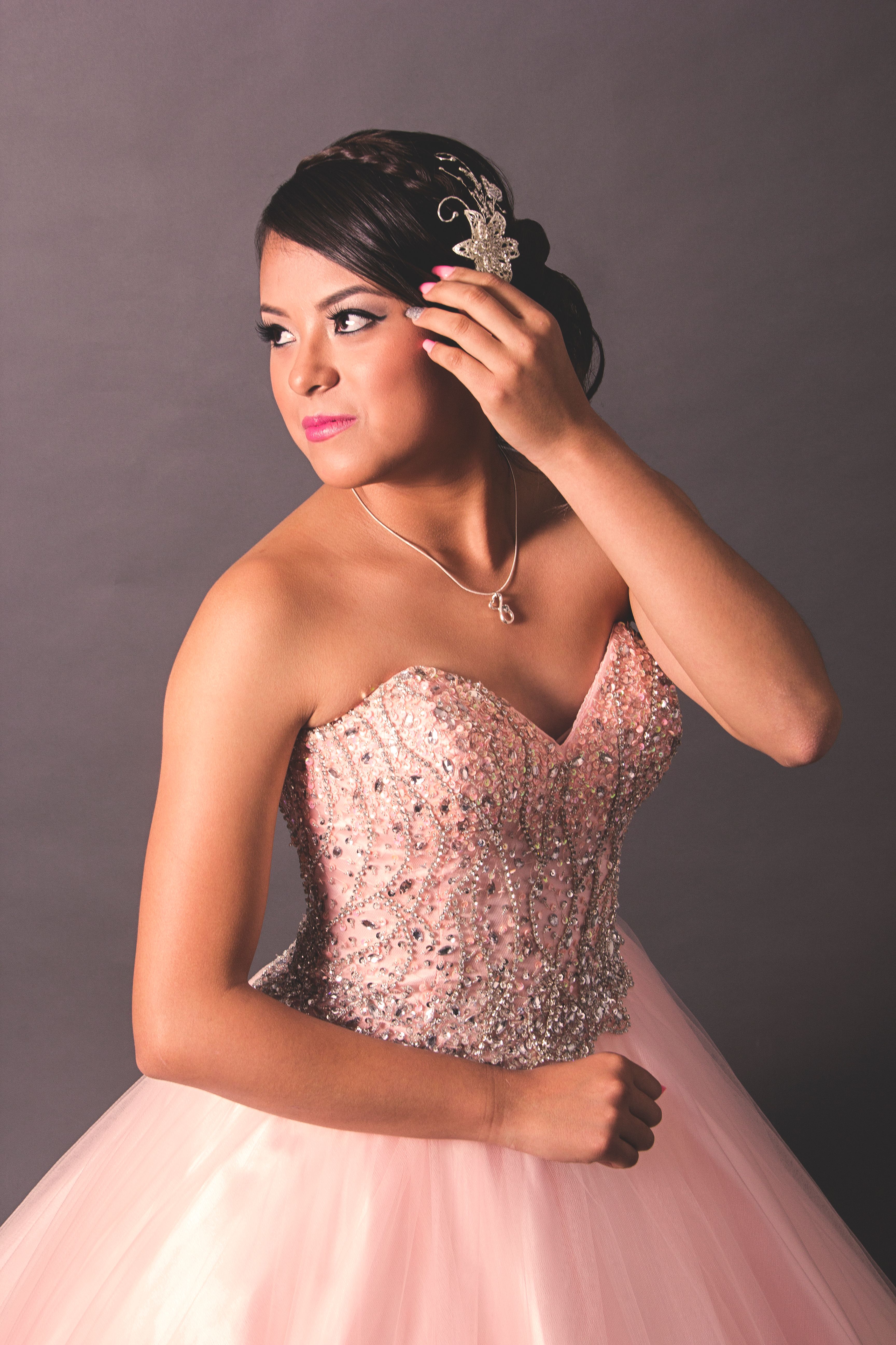 A Woman Posing in a Dress · Free Stock Photo