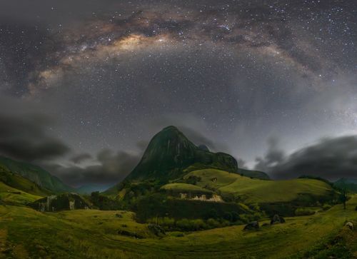 Free Milky Way Arch Over the Mountain Stock Photo