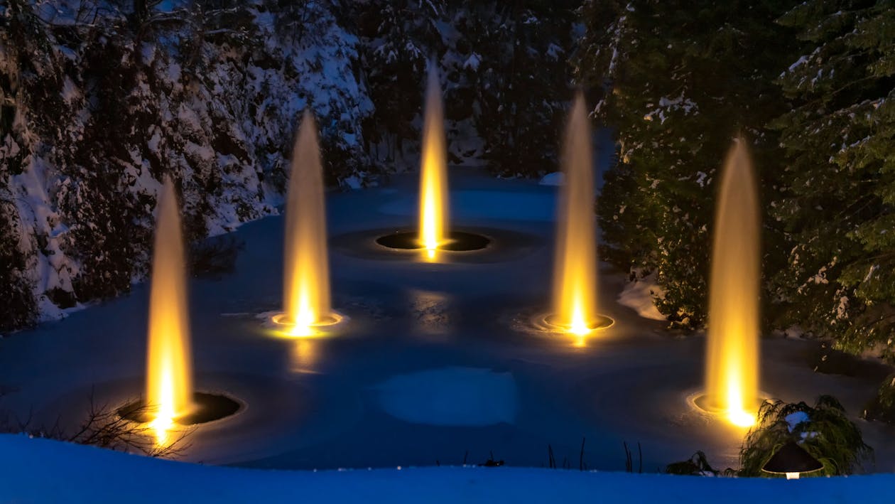 Light Fountain On Frozen Pond