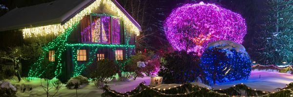 Christmas light installation on house