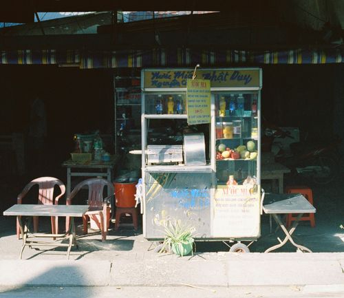 Free A street vendor stand selling fresh fruits and bottled drinks in a rural concession setting. Stock Photo