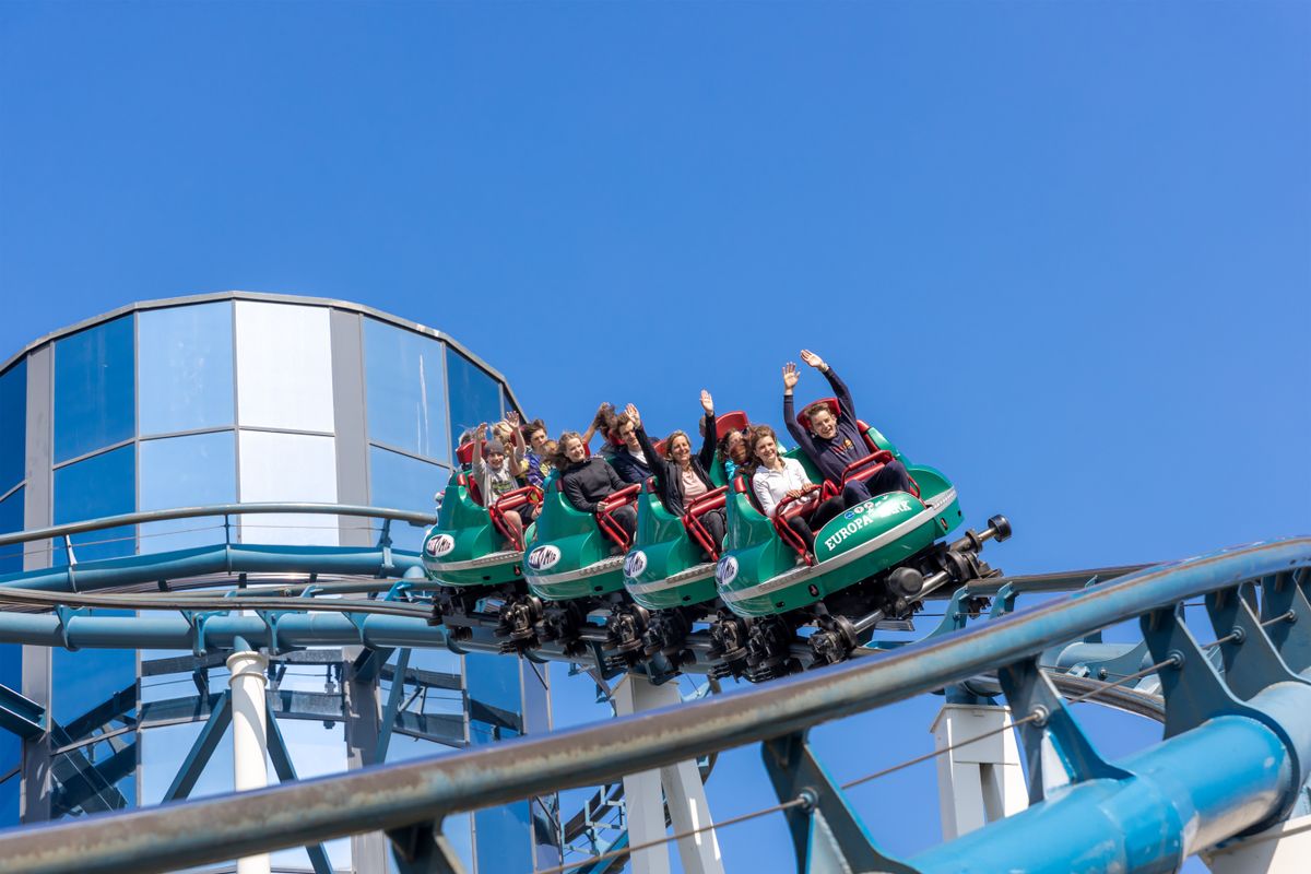 People enjoying a thrilling ride at a themed attraction