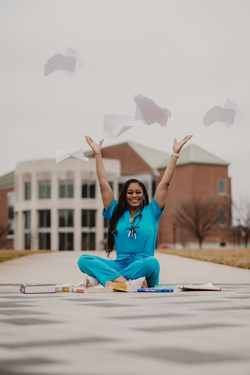 Graduate healthcare student in scrubs, a sector at the centre of the lawsuit over new federal loan caps