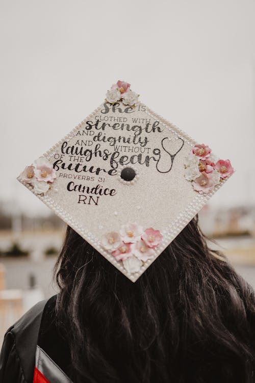 Woman Wearing Hat on a Graduation Day 
