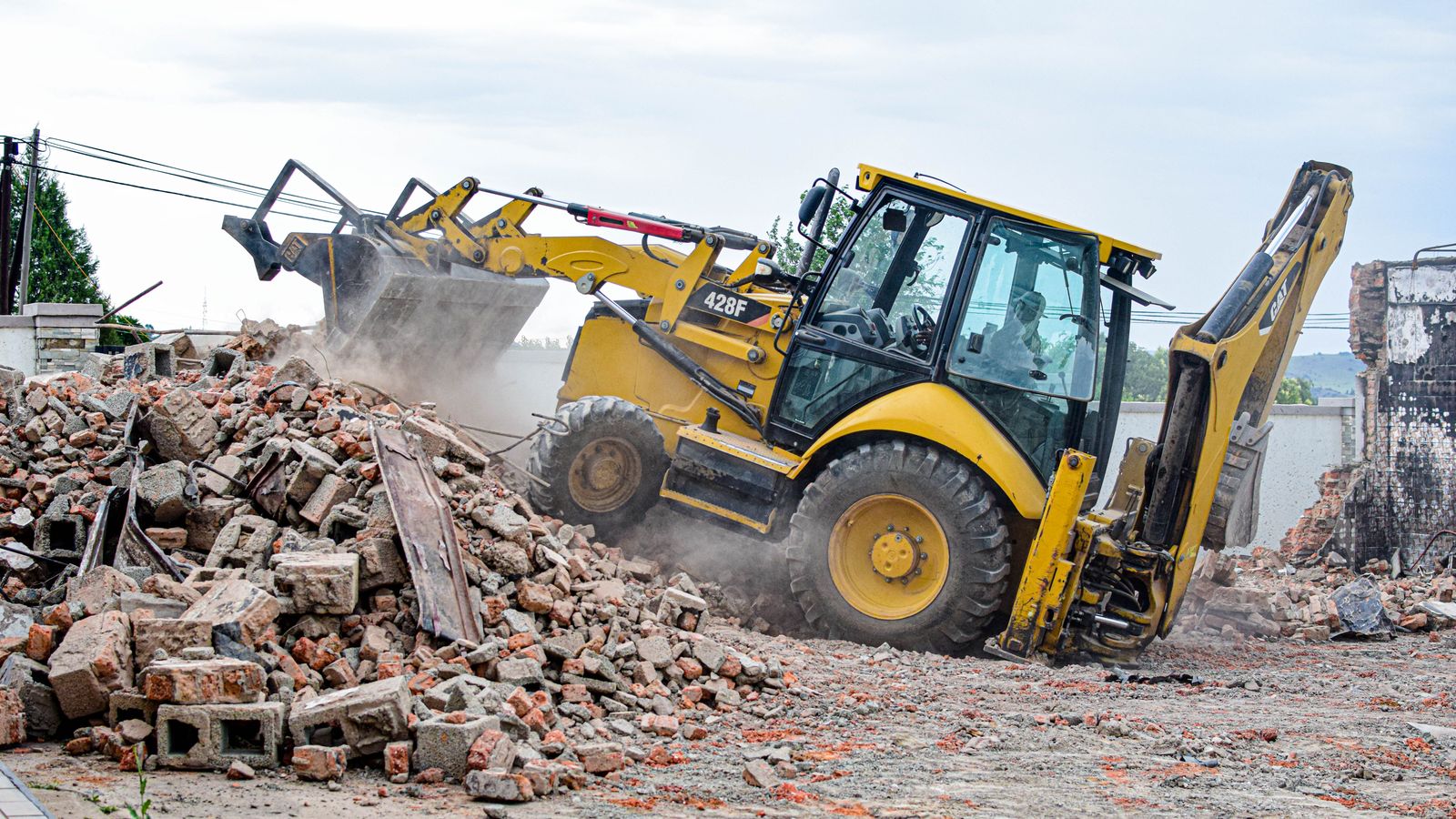 Excavator in ruins, Lesotho