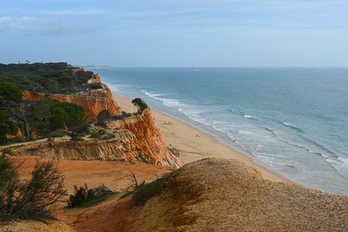 Free Breathtaking view of rocky cliffs and coastline in Faro, Portugal. Stock Photo