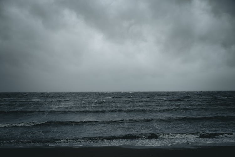 Ocean Shore On Cloudy Moody Day