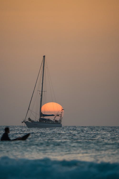 Photos gratuites de bateau, ciel, coucher de soleil