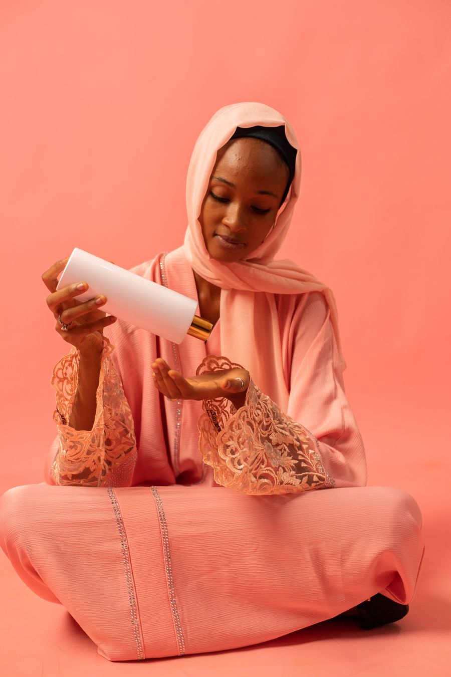 Woman with beauty products