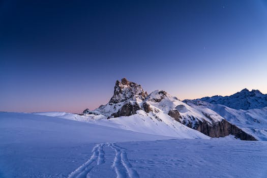 A stunning winter sunset over snow-covered Pic du Midi d'Ossau in the Pyrenees.