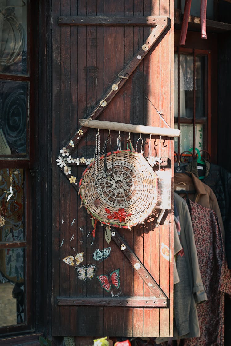 Rustic Decorations Hanging On Wooden Shutter