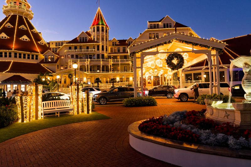 The illuminated Hotel del Coronado at dusk on Coronado Island, California