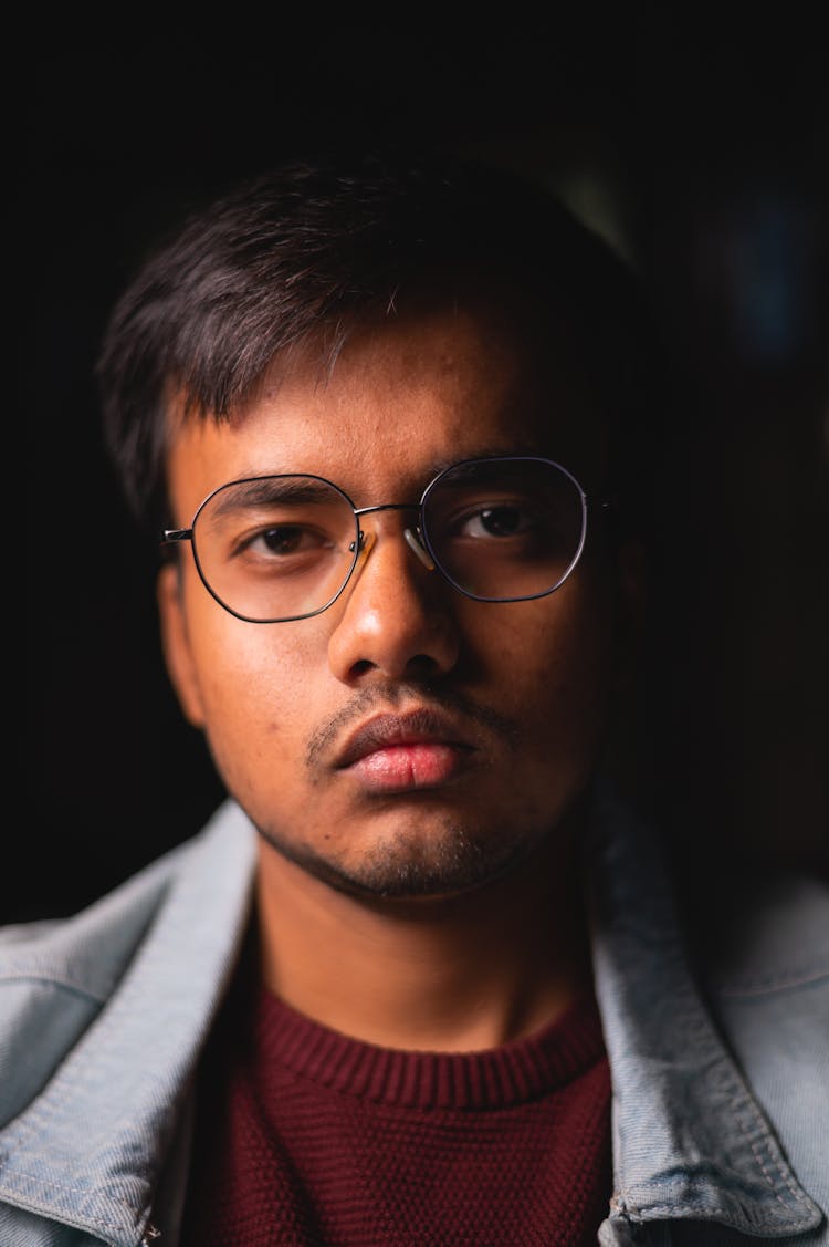 Portrait Of A Serious Man Wearing Eyeglasses