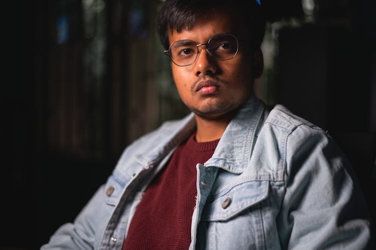 Portrait Of A Serious Man Wearing Eyeglasses