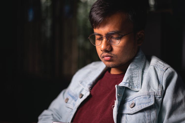 Portrait Of A Serious Man Wearing Eyeglasses 