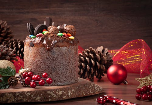 Chocolate Cake Set on Wooden Tray next to Christmas Decor